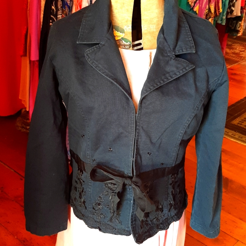 Bci blue cotton jacket with grosgrain belt and appliques.